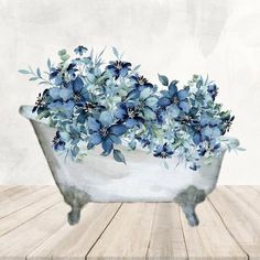 a painting of blue flowers in a bathtub on a wooden table with white walls