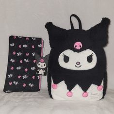 Price Is Firm. Please Do Not Make Any Offers Unless Bundled With Other Items With A Reasonable Offer. Loungefly Kuromi Mini Backpack. Sweet And Mischievous, Kuromi Is The Perfect Travel Companion! This Mini Character Backpack Consists Of A Black Sherpa Body And Fuzzy Embroidered Details On Kuromi With Her Ears In 3d. Features A Faux Leather Bottom And Adjustable Straps, Inner Drop Pocket And Silver Tone Hardware. Approx: 8" X 4 1/4" X 11" Loungefly Kuromi Poses Makeup Bag. Look As Cute As Kuromi Black Bag With Case For Everyday Use, Cute Black Bag With Removable Pouch, Cute Black Shoulder Bag Backpack, Black Pouch Backpack For School, Cute Black Zipper Pouch Bag, Cute Black Bag With Zipper Pouch, Back To School White Bag With Zipper Pouch, Black Backpack With Dust Bag For School, Kuromi Loungefly