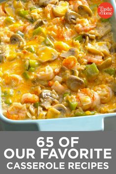 the casserole dish is full of shrimp, mushrooms and carrots in a creamy sauce