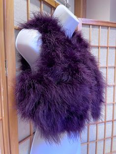 Gorgeous dark plum purple vintage 80s Penny Lane faux Mongolian Lamb fur cropped vest.  Vegan fur / animal friendly fur vest.  Single hook & eye front top closure. Liquid satin lining.  Super soft & pretty with an incredibly luxe rich hippie Boho vibe. Has a lovely fluffy quality to it that's like little ostrich feathers!  One in a million color too! 💥Approximate Measurements (lying flat, closed): Armpit to Armpit: 18" Length from Shoulder Top to Bottom Hem: 12.5" 💥Condition: Excellent conditi Purple Fluffy Jacket, Lavender Fur Coat, Purple Fur Coat, Winter Purple Faux Fur Coat, Winter Purple Faux Fur Outerwear, Purple Faux Fur Vest, Fur Animal, Mongolian Lamb, Liquid Satin