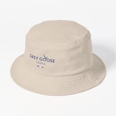 This packable, scrunchable, lightweight headwear classic is ready for adventure, from the beach to the street to the trailBreathable 100% cotton with eyelet ventilationFlat topModerate brim is 2.2"" (5.5 cm) wide to keep the sun off your faceUnstructured crown is 3.1"" (8 cm) deepEasy care: just spot clean and dry in shade. Grey Goose Vodka, Bucket Hat Design, Grey Goose, Hats For Sale, Flats Top, Hat Designs, Dad Hats, Bucket Hat, The Sun