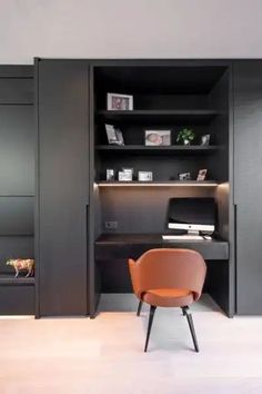 a chair sitting in front of a book shelf