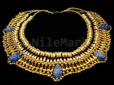 "Your looking at a beautiful collar necklace . This collar decorated with 5 blue scarabs and beads in the colors, black, orange and gold tone. Please see measurements. This necklace are inspired from the ancient Egyptian jewelry of queens and pharaohs and often used in belly dance. This is also fantastic for everyday use wearing the collar with a clingy black dress. This collar is fantastic and hand made in egypt.the necklace have \"gold-tone\" clasp Details: Size (Approx) : One size fits All Gr Cleopatra Jewelry, Cleopatra Necklace, Queen Cleopatra, Ancient Egyptian Jewelry, Egyptian Culture, Historical Jewellery, Long Pearl Necklaces, Tutankhamun, Egyptian Jewelry