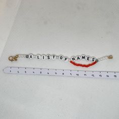 a ruler that has some type of name on it with the word ballist of names written across it