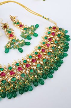 A beautifully handcrafted neckpiece worked in gold, finished with an array of semi-precious gemstone drops and encrusted with kundan. This choker set is based in silver alloy plated with 22k gold. Necklace Closure - Adjustable Dori Earrings Closure - Push Back Necklace - 14 inches Earrings - 3.5 inches Style Tip - A perfect choker for someone who's styling decisions always start and end with putting timeless classics together to create a magical and unique look. An accessory so versatile, we are Gold Multi-stone Necklace For Ceremonial Occasions, Ceremonial Gold Multi-stone Necklace, Kundan Necklaces With Stones For Gift, Kundan Necklaces With Stones As Gifts, Festive Multicolor Stone Necklaces, Festive Stone Necklaces, Festive Necklaces With Stones, Festive Multicolor Stone Necklace, Fusion Kundan Necklaces With Stones