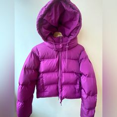 Nwt! Sure To Keep You Warm And You’ll Stand Out! So Cute! Brand: Good American All Inclusive Line Co Founded By Khloe Kardashian Sku: Gp0916 Pop Thistle Retails: $185 Size 3 = Large Color Purple Filled With Polyester Zipper Removable Quilted Hood With Adjustable Draw Cord At Good Opening Stoppers At Front I Side Rubber Coated Pull Zipper Front Pockets Trendy Purple Hooded Outerwear, Hooded Purple Outerwear For Fall, Purple Hooded Outerwear For Fall, Hooded Purple Puffer Jacket For Winter, Purple Hooded Puffer Jacket For Winter, Purple Outerwear For Cold Weather In Spring, Purple Long Sleeve Outerwear For Cold Weather, Purple Winter Outerwear, Long Sleeve Purple Outerwear For Cold Weather