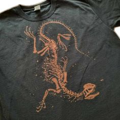 a t - shirt with an image of a skeleton running