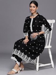 Black embroidered Kurta with PalazzosKurta design:Floral embroideredA-line shapePleated styleRound neck, three-quarter regular sleevesChikankari detailCalf length length with flared hemCotton blend machine weave fabricPalazzos design:Embroidered PalazzosPartially elasticated waistbandSlip-on closure Chikankari Kurta, A Line Kurta, Satin Saree, Kurta Designs, Thread Work, Design Floral, Mandarin Collar, Shirt Collar, Yellow Floral