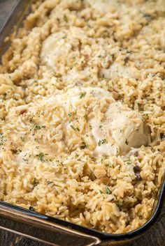 a casserole dish filled with chicken and rice