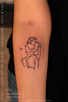 a woman with a tattoo on her arm holding a man's head in the shape of a heart