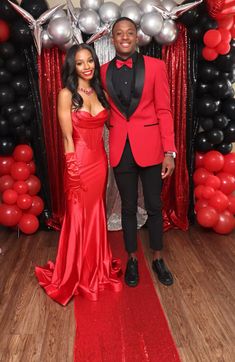 Red Prom Tux Guys, Men Red Prom Outfit, Red Prom Men, Red Tuxedo For Men Prom, Red Prom Tuxedo, Red Tux Prom, Red And Black Prom Couples