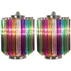 pair of multicolored glass table lamps on chrome bases