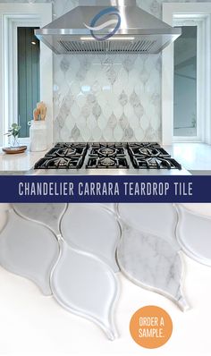 an image of a kitchen with white tiles and marble counter tops on the same tile