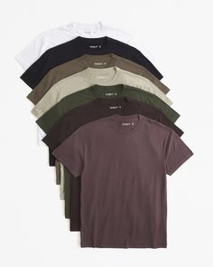 7-pack of our short-sleeve crewneck tees in our 180g softAF fabric, featuring a straight hem and relaxed-fit silhouette that's slightly roomier through the shoulders and body than our core fit. Brownish Purple, University Of New Hampshire, T Shirts Men, Men's Tops, New Hampshire, Hampshire, Abercrombie Fitch, Light Brown, Fabric