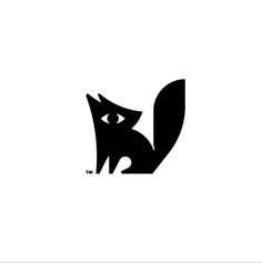 a black and white logo with an animal's face