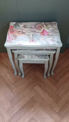 two small stools sitting on top of each other