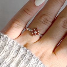 Lucky Ring in Natural Garnet. This beautiful cluster set ring features four approximately 3mm natural garnets. Genuine Garnets Ethically Sourced Sterling Silver, Solid 10k Gold, or Solid 14k Gold Approximately 0.44 carats total weight Garnets are the birthstone for January. Garnets have been found in jewelry dating back to the Bronze Age. Garnets were worn as talismans by warriors and travelers across a multitude of cultures throughout history. It was once believed by Native American healers tha Collectible Garnet Ring, Fine Jewelry Garnet Rings With Polished Finish, Garnet Heart Ring, Garnet Heart Rings, Lucky Ring, Garnet Rings With Polished Finish - Fine Jewelry, Clover Ring, Inlay Jewelry, Crystal Structure