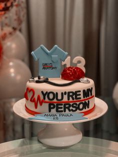 there is a cake that says you're my person on the top of it