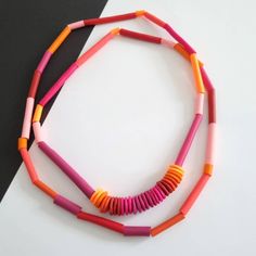 With every order you get a gift. Welcome!🤗 Light and effective geometric necklace.  The necklace can be worn in two ways, once or twice around the neck.  Colors: neon orange, orange, a few shades of pink, magenta...  The beads are on waxed cotton thread.  Necklace length is 120cm. The tube beads are approx. 7mm thick. Very comfortable to wear. Made when ordered. Polymer clay is a relatively new material. For jewelry made of polymer clay, do not act like it's metal or wood jewelry. Clay is durab Modern Orange Necklace As Gift, Modern Orange Necklace For Gift, Unique Orange Long Necklace, Orange Long Necklace For Gifts, Orange Long Necklace For Gift, Orange Long Necklace Gift, Long Orange Necklace For Gift, Orange Long Beaded Necklace For Gifts, Orange Long Beaded Necklace For Gift