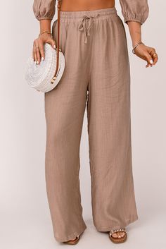 Khaki High Waist Drawstring Wide Leg Casual Pants Solid Wide Leg Beach Pants With Drawstring, Khaki Bottoms With Elastic Waistband For Beach, Khaki Bottoms With Drawstring For Spring, Khaki Drawstring Bottoms For Spring, Spring Khaki Bottoms With Drawstring, Beige Wide Leg Summer Pants With Drawstring, Spring Khaki Drawstring Bottoms, High Waist Drawstring Vacation Pants, Beige Drawstring Wide Leg Pants For Summer