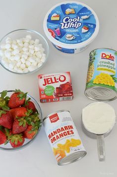 the ingredients to make this dessert include strawberries, yogurt, and marshmallows