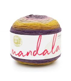 a ball of yarn with the word mandala written on it in red and yellow