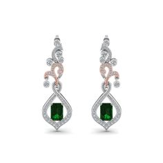 The Pave Diamond Dangle Drop Earring portrays impeccable elegance and beauty with the shimmering round cut diamonds arranged exquisitely in a gorgeous and vintage design. The diamond earring features a classic drop feature with a spectacular emerald cut diamond in an elegant prong setting offering you added flair and panache.  Emerald cut diamonds of 1 ct. with Clarity VS2 and Color H and round cut side stones of 1.21 ct. with Clarity VS2 and Color G in a prong, pave and bezel setting respectively. Total Carat Weight:- 2.21 Total Number of Diamonds:- 114 This diamond earring is also available in other metals and gemstones of your preference. Free Shipping Within USA. 1 Year Manufacturing Warranty. Easy Returns and Financing Available. Guaranteed lower diamond price than any Luxury Brilliant Cut May Birthstone Earrings, Luxury Brilliant Cut Earrings For May Birthstone, Luxury Diamond Earrings For May Birthstone, Luxury Gemstone Accented Earrings For Weddings, Luxury Diamond Accented Earrings For May Birthstone, Luxury Dangle Earrings For May Birthstone, Luxury Diamond Earrings With Gemstone Accents As Gift, Luxury Gemstone Accented Earrings For May Birthstone, Luxury Diamond Earrings With Gemstone Accents