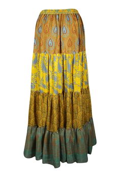 Infuse your wardrobe with vibrant energy through this flared maxi skirt, crafted from upcycled saree fabric for an eco-friendly twist. Its Medallion Yellow hue and intricate floral patterns are paired with bold, striking prints, making each silk blends skirt a one-of-a-kind treasure. The adjustable drawstring waist ensures a customizable, comfortable fit, while the ankle-length, flowing silhouette offers both elegance and ease. Whether you're browsing a farmer's market or swaying to the music at Yoga Mala Beads, Skirt Patchwork, Beach Maxi Skirt, Flare Maxi Skirt, Boho Pants, Vibrant Energy, Boho Skirts, Saree Fabric, Farmer's Market