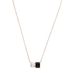 Shimmering in hues of white and brown, this Suzy Levian necklace is as on trend as can be, and features a round cut white topaz and an emerald cut brown smoky quartz as a perfectly matched pair. This necklace symbolizes a perfect pairing of unique shapes. This necklace is constructed from rose sterling silver, making it durable and easy to clean. The high-shine polish of the piece is sure to draw attention at any cocktail party or special event. Suitable for any occasion, this necklace adds dime Formal Brown Gemstone Necklace, Elegant Brown Necklace For Anniversary, 2024 Style, Unique Shapes, Beautiful Inside And Out, Creating Jewelry, Topaz Gemstone, Creative Arts, Quartz Stone