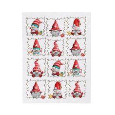 a white napkin with red and green gnomes on it