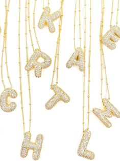 18K Gold Makes the perfect gift CZ detailing 0.75" Initial pendant 18" Chain length with 2" extension This 18k Gold Ballon Initial Necklace is a timeless classic. Each necklace is designed to stand out with its delicate Bubble Balloon style lettering. It glistens in the light with the intricate CZ stones. Balloon Necklace, Charm Bar, Bar Fits, Cowgirl Jewelry, Bubble Balloons, Initial Pendant, Jewelry Inspo, Cz Stone, Bar Necklace