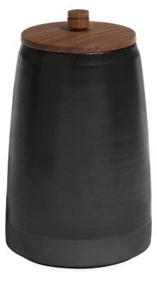 a black ceramic jar with a wooden lid