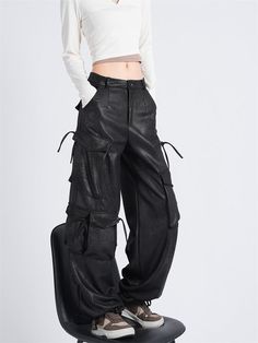 Features: Get a hint of vintage streetwear with our Black Gothic Baggy Cargo Pants. These pants, with a wide leg and an emo aesthetic, are perfect for a 90s-inspired look. Stay stylish and comfortable with this unique blend of fashion and function. Trendy Black Wide-leg Parachute Pants, Black Straight Leg Punk Cargo Pants, Trendy Black Wide Leg Parachute Pants, Baggy Black Wide Leg Pants For Streetwear, Black Baggy Wide Leg Pants For Streetwear, Grunge Full Length Pants For Fall, Grunge Pants For Fall Streetwear, Edgy Baggy Bottoms For Fall, Punk Wide Leg Cargo Pants For Streetwear