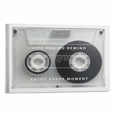 two cassettes with the words life has no rewind and enjoy every moment