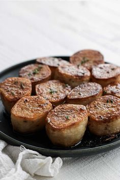 some food is on a black plate and ready to be eaten