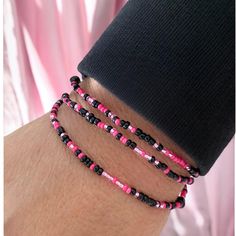 🌴 Hello and welcome !  🌴 These dainty thin pink and black STRETCH bracelets are custom handmade for you in all sizes !  🌴 Materials :  * Tiny dark rose pink & black glass seed beads .  * Teeny tiny, sparkly, silver lined light pink crystal beads crystal beads filled with fabulous, happy, uplifting energy   🌴 These are extremely well made stretch bracelets. I hand choose, and hand string every single tiny crystal. Your bracelets will retain their size, and you will never see a knot in them.   🎁 Gift bag is included ...Your bracelets arrive in a beautiful golden jewelry pouch, ready for gifting or keeping. When you open the pouch you will see a burst of gorgeous colorful beads with sparkly crystals !  🌴 Thank you for visiting the Smilebkind jewelry shop ... You are beautiful and perfec Black Seed Bead Bracelet, Pink Seed Bead Bracelet, Sparkly Crystals, Diy Jewelry Unique, Dark Rose, Seed Bead Bracelet, Golden Jewelry, Silver Line, Seed Bead Bracelets