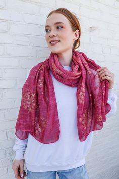 A special cranberry cuddle scarf, luxurious accessory designed to wrap mom or someone special in comfort and style. This scarf is not only stylish and warm but also serves as a heartfelt gift to express love and care for someone who is physically separated from their loved ones. Find the perfect mother's day gift Gold foil flower printed on this flowing lightweight Viscose scarf, this scarf features a delicate cranberry hue that evokes a sense of calm and relaxation. Adorned with shimmering gold Red One-size Shawl As Gift, Pink Scarves As Gifts, Pink Shawl Scarf For Festive Occasions, Red Shawl Scarf For Gift, Red Scarves For Gifts, Flower Scarf, Transparent Bag, Feuille D'or, Rose Gold Foil