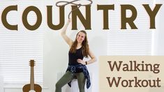 a woman standing in front of a sign that says country walking workout