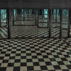 an empty room with black and white checkered floor