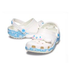 Introducing The Limited Edition Crocs Hello Kitty And Friends Cinnamoroll Classic Clog, Celebrating The Brand's 50th Anniversary. These Slip-On Clogs Feature An Ankle Strap With A Strap Accent, Providing Both Comfort And Style. The Synthetic Upper Material Is Paired With A Rubber Outsole And Insole Material, Making Them Perfect For Walking, Beach, And Fishing Activities During Summer, Fall, And Spring Seasons. These Unisex Adults' Shoes Are Ideal For Travel And Casual Occasions, With A White And Slime Easy, Fishing Activities, Crocs Baya, Walking Beach, Crocs Men, Hello Kitty And Friends, Crocs Classic Clogs, Platform Clogs, Women's Crocs