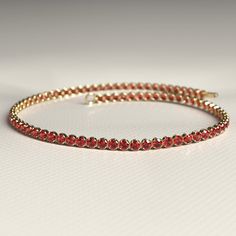 Get ready to make a stylish statement this Thanksgiving with our Red Garnet Tennis Bracelet in 14K/18K Solid Gold. Perfect for stacking or wearing alone, this custom bracelet features the vibrant January birthstone. Handmade with love, this personalized piece makes for a unique and thoughtful Thanksgiving gift.𝐅𝐞𝐚𝐭𝐮𝐫𝐞𝐬:• 𝐌𝐚𝐝𝐞 𝐭𝐨 𝐎𝐫𝐝𝐞𝐫• 𝐌𝐞𝐭𝐚𝐥: 𝟏𝟒𝐊 | 𝟏𝟖𝐊• 𝐁𝐚𝐧𝐝 𝐂𝐨𝐥𝐨𝐫𝐬: Rose Gold, Yellow Gold & White Gold• 𝐂𝐮𝐬𝐭𝐨𝐦 𝐂𝐫𝐨𝐜𝐨𝐝𝐢𝐥𝐞 𝐋𝐨𝐜𝐤𝐒𝐭𝐨𝐧𝐞:• ? Red Jubilee Tennis Bracelet For Anniversary, Stacked Wedding Rings, Custom Bracelet, Birthstone Bracelet, January Birthstone, Band Bracelet, Birthstone Bracelets, Engagement Rings Oval, Thanksgiving Gift