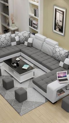 a modern living room with grey and white furniture