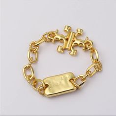 Tory Burch Bracelet. Stunning Piece!!! Looks So Beautiful. It Will Upgrade Any Outfit. Reposhing This Item I Purchased From @Cakewishes. Loved It, But Decluttering My Closet. Tory Burch Bracelet, Pearl Drop Earrings Gold, Tory Burch Earrings, Tory Burch Kira, T Logo, Juicy Couture Charms, Tory Burch Jewelry, Tory Burch Miller, Chain Gold