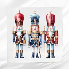 three nutcrackers are standing next to each other