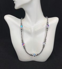 This is a high quality handmade Navajo Pearl silver bead necklace with Crystal. The silver beads are 3,5,6mm and the Crystal are 8mm. Necklace measures 18" long.  Necklace is handmade in USA and of Southwest origin. Thanks for looking and check out more items in my Etsy shop for more great items and deals! https://www.etsy.com/shop/925usa Payment: We accept all major credit cards through direct check out and Paypal. New Mexico residents have to pay sales tax. Payments must be made within 3 days Classic Silver Beaded Necklace With 8mm Beads, Classic Silver Beaded Necklace, Silver Necklaces With 8mm Beads For Jewelry Making, Silver Necklaces With 8mm Sterling Silver Beads, Sterling Silver Single Strand Beaded Necklace, Silver Beaded Necklaces With 8mm Beads For Jewelry Making, Silver Adjustable Beaded Necklace With Polished Beads, Silver Necklace With 8mm Beads And Adjustable Fit, Adjustable Silver Beaded Necklace With Polished Beads