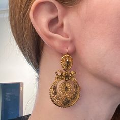 "These earrings are beyond exquisite, BEYOND. I encourage you to zoom way in on the pics and look at the absolutely incredible metal work on these beauties, it is phenomenal. Made circa 1850, very possibly earlier, these earrings are done in the pendeloque style popularized in the mid-1700's. Bezel set foil-backed citrines sit atop hand sawn scrolling metalwork that is full of fine detail. And as if things couldn't get any better, these are also day/night! And they're not just day/night with two Historical Yellow Gold Drop Earrings, Yellow Gold Historical Drop Earrings, Yellow Gold Drop Earrings With Historical Design, Victorian Style Ceremonial Earrings For Pierced Ears, Victorian Style Ceremonial Dangle Earrings, Traditional Yellow Gold Earrings With Historical Design, Victorian Hallmarked Earrings For Ceremonial Occasions, Elegant Yellow Gold Earrings With Historical Design, Victorian Gold Plug Earrings