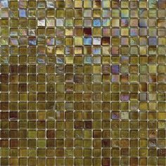 a close up view of a glass mosaic tile wall