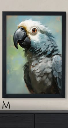 a painting of a parrot is hanging on the wall