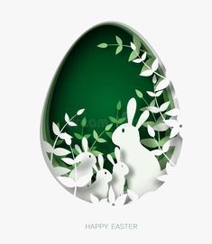 an easter egg with paper cut rabbits and leaves