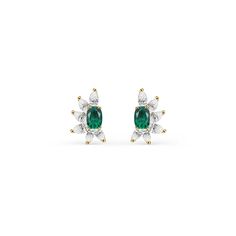 Our Helen earrings combine the timeless elegance of emeralds and diamonds in a contemporary design. Made with high quality cz diamonds and crystal emeralds set in gold plated sterling silver. Custom backs ensure the earrings sit perfectly on the ear. .6" L x .4" W Pierced. Stud style earrings Please contact us to special order larger quantities. Elegant Green Diamond Earrings, Elegant Green Diamond Earrings With Prong Setting, Elegant Green Diamond Earrings In Prong Setting, Elegant May Birthstone Earrings With Diamond Accents, Elegant Earrings With Diamond Accents For May Birthstone, Elegant Diamond-accented Earrings For May Birthstone, Elegant Green Diamond Cluster Earrings, Elegant Green Earrings With Diamond Accents, Green Diamond Earrings With Sparkling Stones